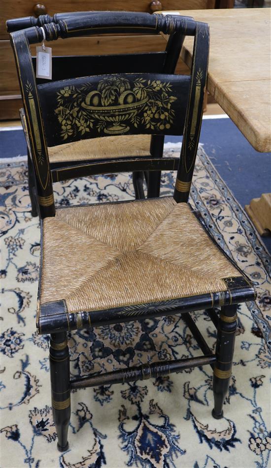 A set of three 19th century American ebonised chairs